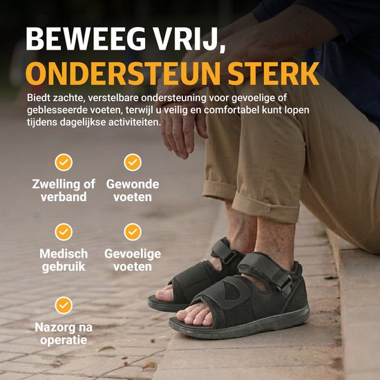 Zwarte BORT verbandsschoenen, open model, met klittenbandsluiting. Getoond op voeten van persoon buiten.