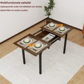 Uitschuifbare eettafel met walnoothouten blad en metalen poten, met opbergruimte onder het tafelblad.