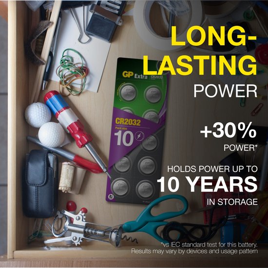 Lade met gereedschap en golfballen. Verpakking met 10 GP Extra CR2032 batterijen. "LONG-LASTING POWER".
