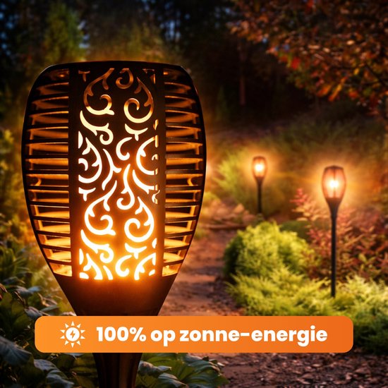 Tuinfakkel op zonne-energie met vlam effect in een tuinpad. Werkt 100% op zonne-energie.