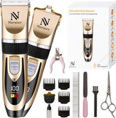 Twee gouden Nuvance hondentondeuses met zwarte details, naast accessoires zoals opzetkammen, een schaar en een nagelknipper.