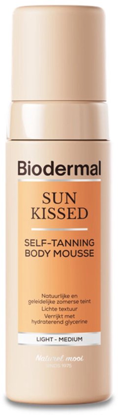 Biodermal Sun Kissed zelfbruinende body mousse in beige fles met oranje label.