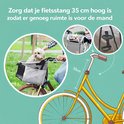 Illustratie van een fietsmand voorop een fiets met een hond erin. "Zorg dat je fietsstang 35 cm hoog is zodat er genoeg ruimte is voor de mand"