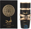 Boîte et flacon noirs avec des détails dorés. Le flacon présente une bande dorée et le texte 'ASAD' en lettres arabes dorées.