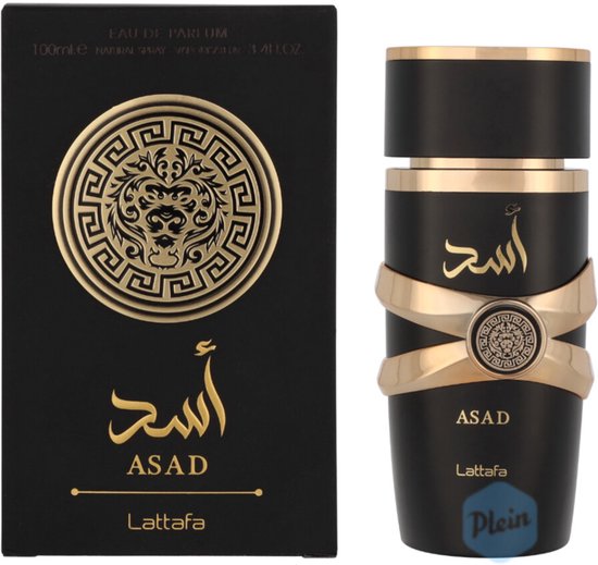 Boîte et flacon noirs avec des détails dorés. Le flacon présente une bande dorée et le texte 'ASAD' en lettres arabes dorées.