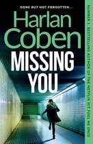 Boek 'Missing You' van Harlan Coben, met een vrouw die wegrent in een gang.