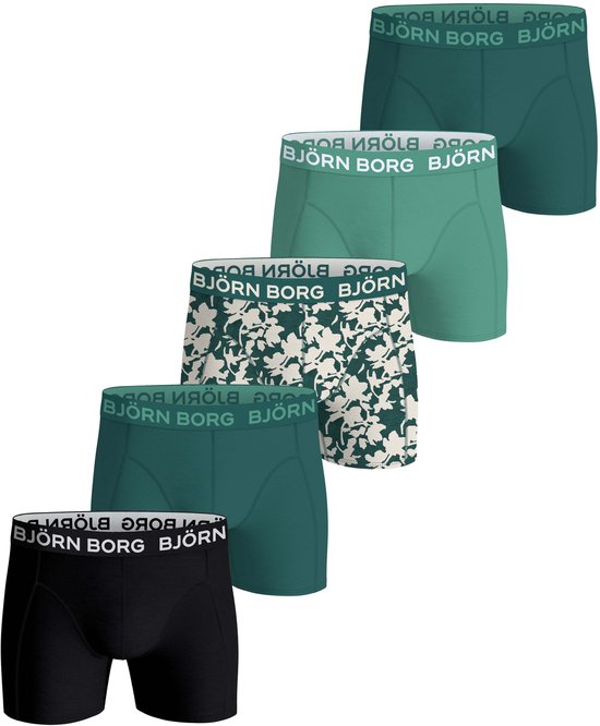 Set van vijf boxershorts in verschillende groentinten, zwart en camouflageprint.