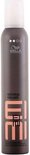 Wella EIMI Natural Volume mousse, 500ml, in grijze spuitbus met oranje logo.