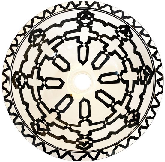 Witte opzetwasbak met zwart geometrisch oosters patroon. De rand heeft een zigzag patroon.