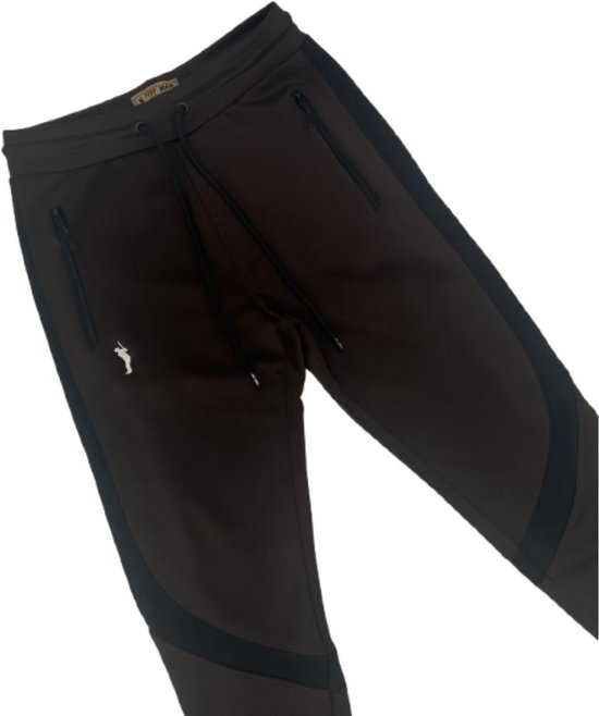 Bruine joggingbroek met zwarte mesh-panelen op het onderbeen, trekkoord in de taille.