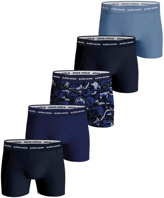 Set van vijf boxershorts in verschillende blauwtinten en prints. Een met steenprint.