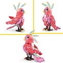 Een roze LEGO papegaai met een kuif en veelkleurige veren, staande op klauwen.