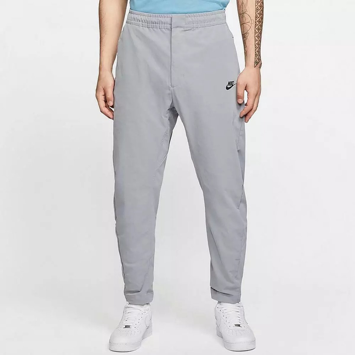 Woven Pants Nike Herenbroek – Standaard Fit Grijs
