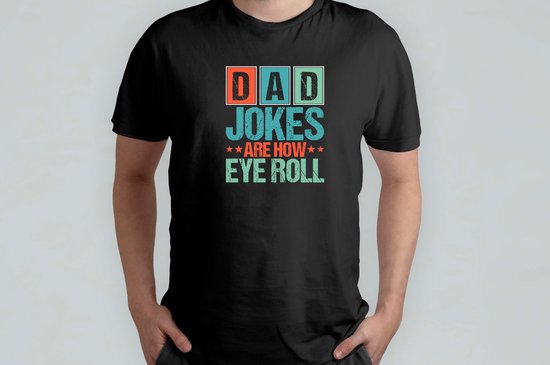 Zwarte t-shirt met tekst 'DAD JOKES ARE HOW EYE ROLL' in gekleurde blokletters.