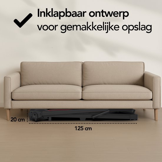 Zwarte inklapbare loopband onder een bank, met afmetingen 20 cm hoog en 125 cm lang.