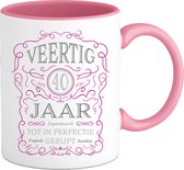 40 Jaar Legendarische Gebrouwen Mok met tekst | Roze - Zilver | Grappig Verjaardag Beker Cadeau | Bedrukte Mokken | Roze | 330 ML