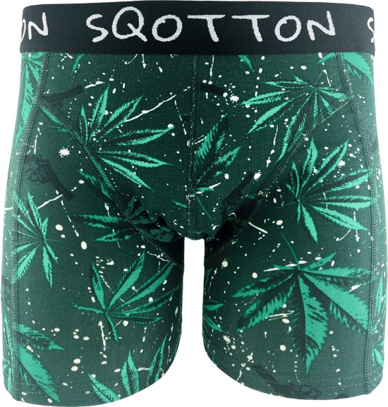 Boxer vert SQOTTON à motif de feuilles de cannabis et éclaboussures blanches, avec ceinture élastique noire.