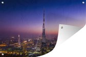 Muurdecoratie Een zeer bijzondere lucht bij avondschemering boven de Burj Khalifa van Dubai - 180x120 cm - Tuinposter - Tuindoek - Buitenposter