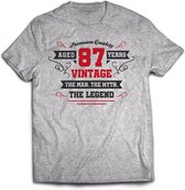 87 Jaar Legend - Feest kado T-Shirt Heren / Dames - Antraciet Grijs / Rood - Perfect Verjaardag Cadeau Shirt - grappige Spreuken, Zinnen en Teksten. Maat L