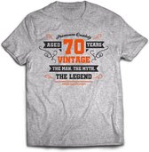 70 Jaar Legend - Feest kado T-Shirt Heren / Dames - Antraciet Grijs / Oranje - Perfect Verjaardag Cadeau Shirt - grappige Spreuken, Zinnen en Teksten. Maat M