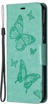 Mobigear Telefoonhoesje geschikt voor Nokia 5.3 Hoesje | Mobigear Butterfly Bookcase Portemonnee | Pasjeshouder voor 2 Pasjes | Telefoonhoesje voor Pinpas / OV Kaart / Rijbewijs - Turquoise