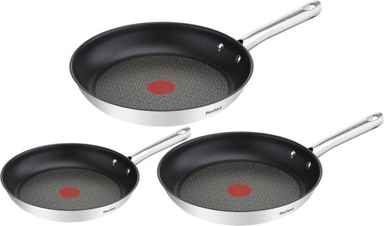 Set van drie Tefal koekenpannen met zwart interieur, grijs patroon, rood logo en metalen handvat.