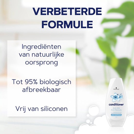 Schwarzkopf conditioner anti-klit fles met blauwe bloemen. Tekst: 'VERBETERDE FORMULE Ingrediënten van natuurlijke oorsprong Tot 95% biologisch afbreekbaar Vrij van siliconen'.