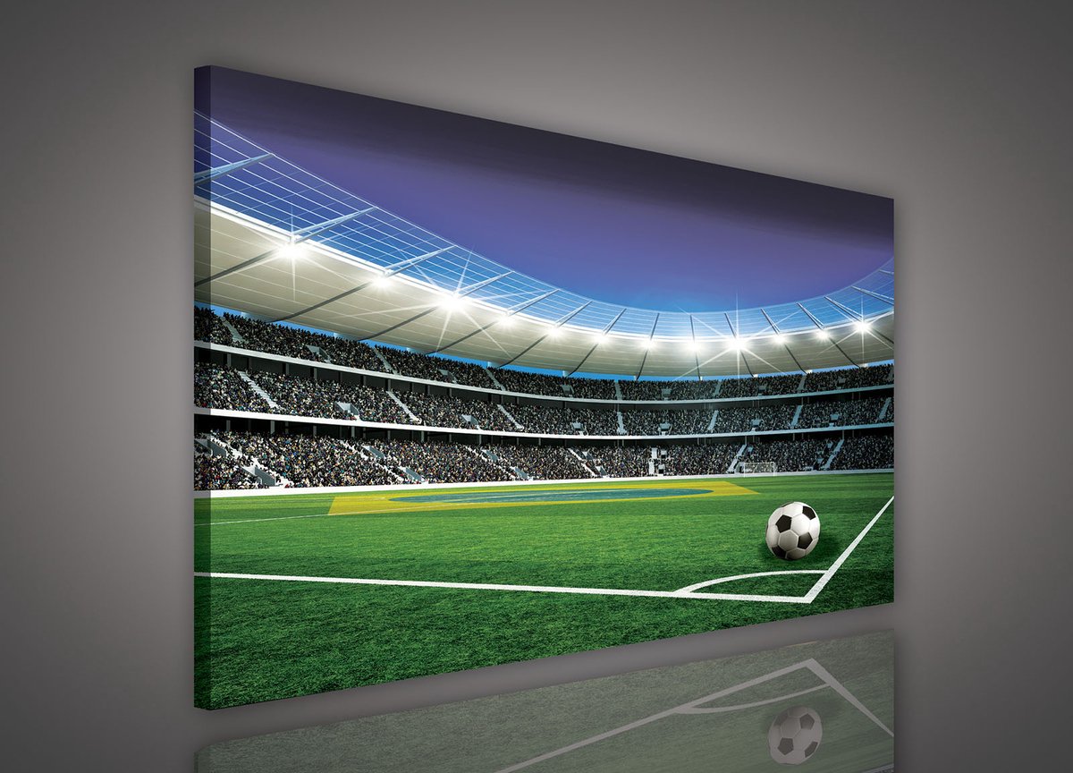 Canvas Schilderij - Voetbal Stadion - Veld - Speler - Stadion - Grass - Groen - Inclusief Frame - 100x75cm (lxb)