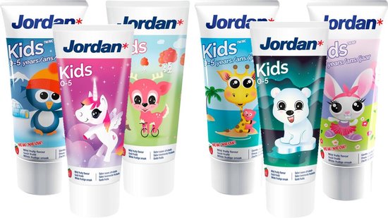 Zes tubes Jordan Kids tandpasta met verschillende kinderontwerpen: pinguïn, eenhoorn, hertje, giraf, ijsbeer en konijn.