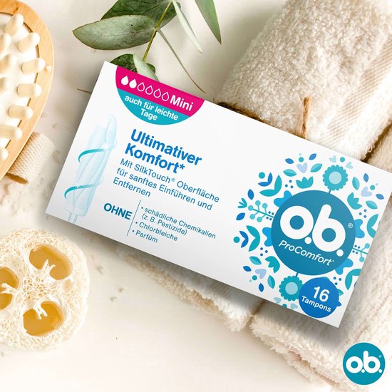 Verpakking van o.b. ProComfort Mini tampons, 16 stuks, voor lichte dagen. Witte doos met blauwe en roze details en plantenmotief.