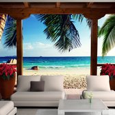 Fotobehangkoning - Behang - Vliesbehang - Fotobehang Uitzicht op het Tropische Paradijs vanaf het Terras - 3D - 300 x 210 cm