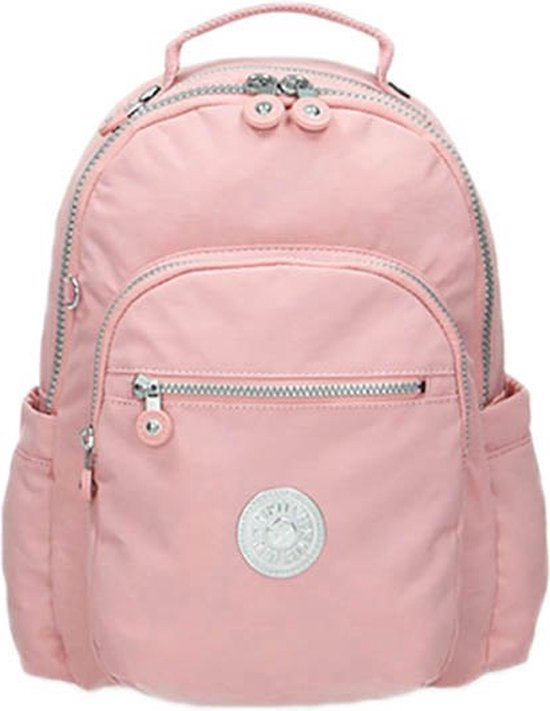 Sac à dos Kipling rose avec deux compartiments zippés et poches latérales.