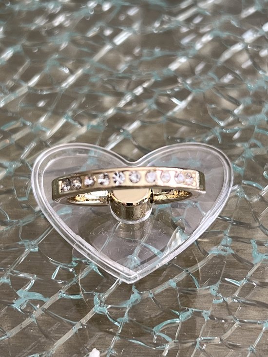 Ring transparent en forme de cœur couleur or avec pierres.