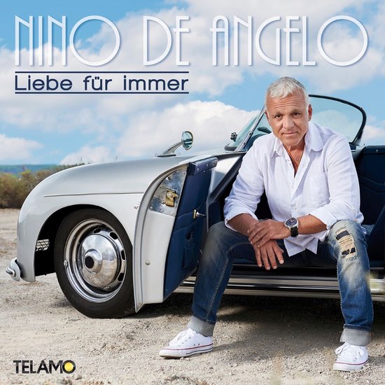 Nino de Angelo, titel 'Liebe für immer', zittend in een zilveren cabriolet, witte hemd, gescheurde jeans.