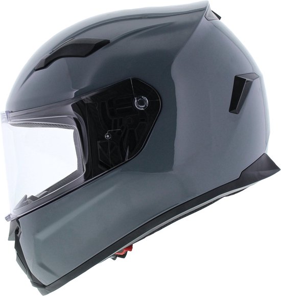 Donkergrijze integraalhelm met helder vizier en ventilatieopeningen.