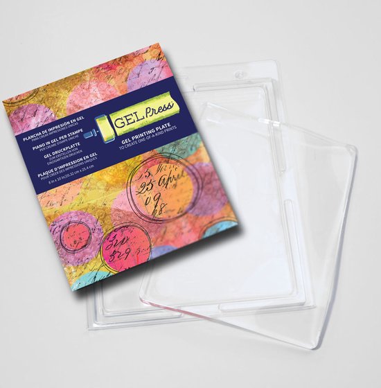 Gele-achtige drukplaat met diverse cirkelvormige en tekstuele patronen, in verpakking naast een lege transparante verpakking.