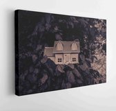 Canvas schilderij - Wooden model of house in the garden. House on tree. Small wooden house in green grass. Selective focus  -     1109262161 - 80*60 Horizontal