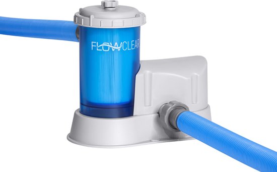 Blauwe filterpomp 'Flowclear' met grijze aansluitingen en blauwe slangen op gras.