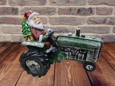 beeldje kerstman op tractor