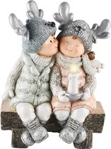 Decoratie kerst winterkindjes meisje jongen op bank 23x18x12 cm | A215027 | Dekoratief