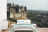 Behang - Fotobehang Carcassonne - Kasteel - Bomen - Breedte 420 cm x hoogte 280 cm