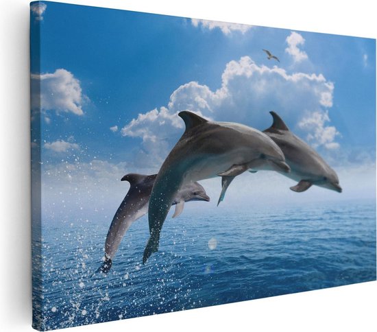 Artaza Canvas Schilderij Dolfijnen Springen uit de Blauwe Zee - 90x60 - Foto Op Canvas - Canvas Print
