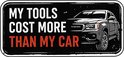 Rechthoekige sticker met tekst 'My tools cost more than my car' en een illustratie van een pick-up truck.