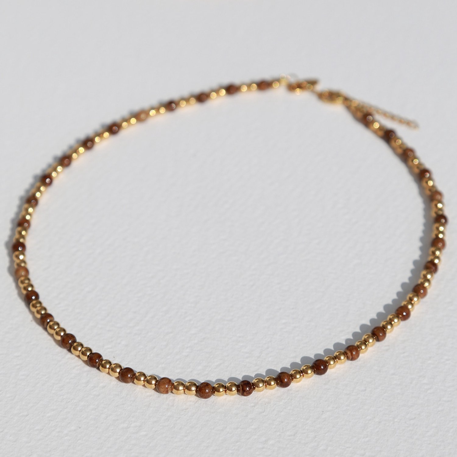 Ketting Moraira bruine steen