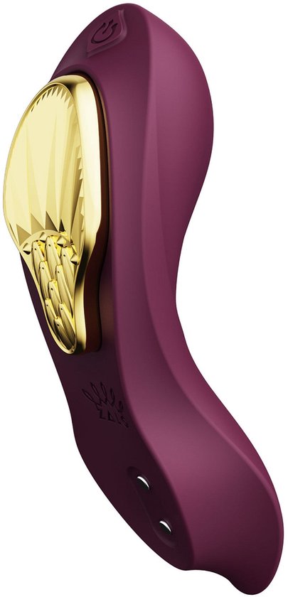 Vibrateur violet avec insert doré, vu de côté.