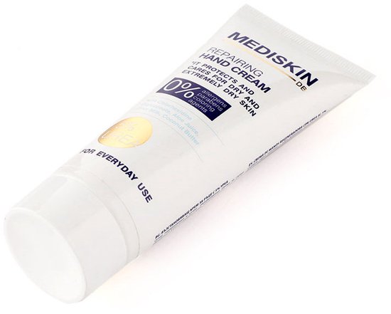 Grijze Mediskin handcrème tube met "REPAIRING HAND CREAM" en "FOR EVERYDAY USE" in blauw.