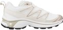 Witte Salomon XT-6 Expanse sneaker met beige lijnen en de tekst 'XT-6 EXPAND' op de zijkant.