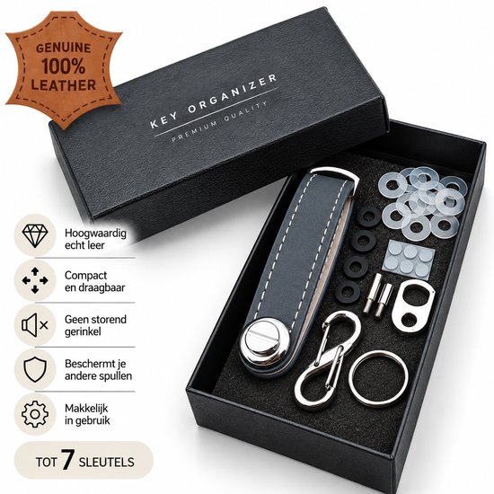 Sleutelorganizer van grijs leer in een doos, inclusief accessoires en karabijnhaak. 100% echt leer.