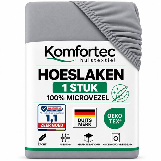 Drap-housse gris Komfortec en microfibre 100%, avec bord élastique et labels de qualité sur l'emballage.
