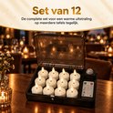 Complete set van 12 witte LED-waxinelichtjes in een oplaadstation met ingebouwde afstandsbediening.